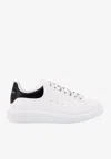 Alexander Mcqueen White And Black Low-top Sneakers With Chunky Sole And Contrasting Heel Tab In Leather Man In White
