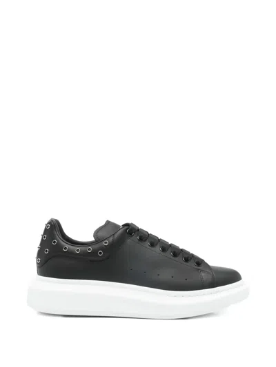 Alexander Mcqueen Oversized Eyelet-detail Sneakers In Black