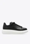 Alexander Mcqueen Oversized Grained Leather Sneakers In Black
