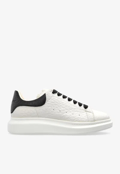 ALEXANDER MCQUEEN OVERSIZED GRAINED LEATHER SNEAKERS