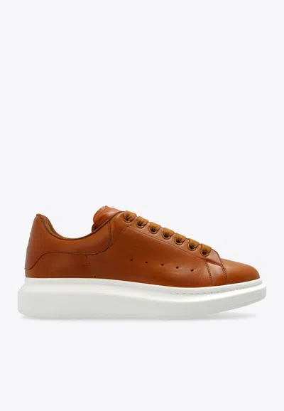 Alexander Mcqueen Oversized Leather Low-top Sneakers In Brown