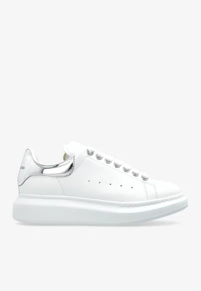 ALEXANDER MCQUEEN OVERSIZED LEATHER LOW-TOP SNEAKERS