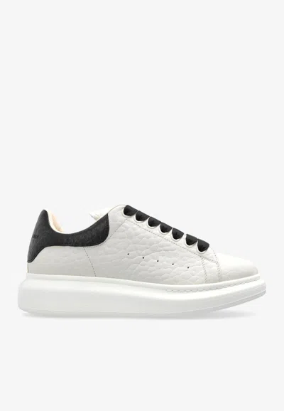 ALEXANDER MCQUEEN OVERSIZED LEATHER LOW-TOP SNEAKERS