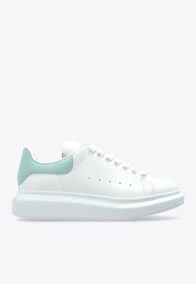 ALEXANDER MCQUEEN OVERSIZED LEATHER LOW-TOP SNEAKERS