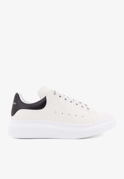Alexander Mcqueen Men White And Black Low-top Sneakers With Chunky Sole And Contrasting Heel Tab In
