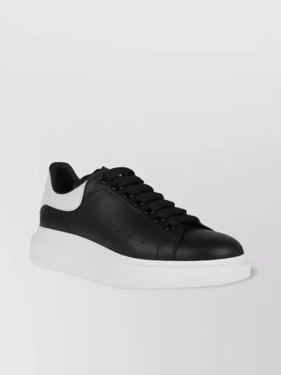 ALEXANDER MCQUEEN OVERSIZED LEATHER SNEAKER WITH PERFORATED SIDES