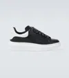 Alexander Mcqueen Black Low Top Sneakers With Logo Lettering On The Tongue In Leather Man In Black