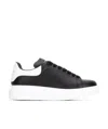 Alexander Mcqueen Leather Exaggerated-sole Sneakers In Black