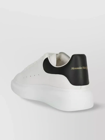 ALEXANDER MCQUEEN OVERSIZED LEATHER SNEAKERS PERFORATED DETAILING