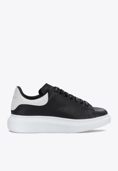 ALEXANDER MCQUEEN OVERSIZED LOW-TOP SNEAKERS