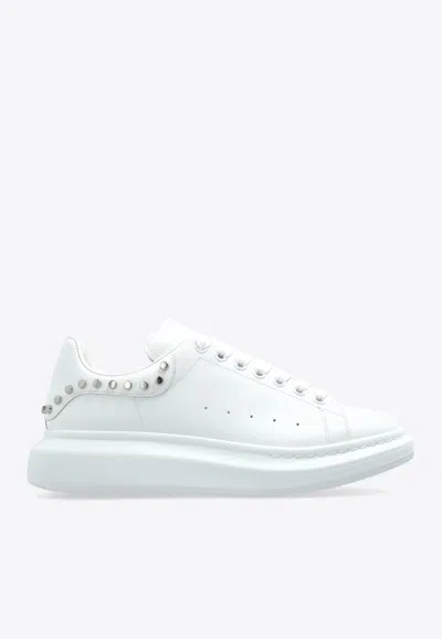 ALEXANDER MCQUEEN OVERSIZED LOW-TOP SNEAKERS WITH STUDS
