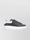 Alexander Mcqueen Leather Exaggerated-sole Sneakers In Black