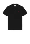 Alexander Mcqueen Inverted Skull Polo Shirt In Black Washed