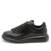 Alexander Mcqueen Black Sneakers With Logo Lettering On The Rear And Oversize Rubber Sole In Leather