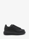 Alexander Mcqueen Black Sneakers With Logo Lettering On The Rear And Oversize Rubber Sole In Leather In Black