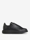 Alexander Mcqueen Exaggerated-sole Studded Leather Sneakers In Black
