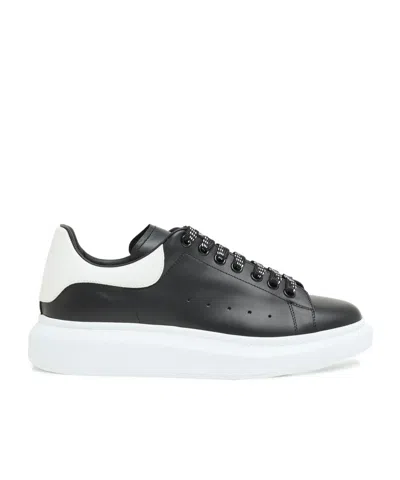 Alexander Mcqueen Black Low Top Sneakers With Logo Lettering On The Tongue In Leather Man