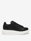 Alexander Mcqueen Oversized Grained Leather Sneakers In Black