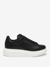 Alexander Mcqueen Oversized Grained Leather Sneakers In Black