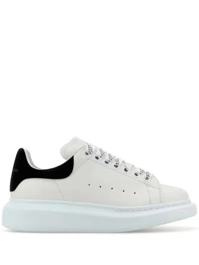 ALEXANDER MCQUEEN OVERSIZED SNEAKERS IN WHITE/BLACK