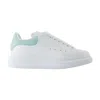 Alexander Mcqueen Leather Sneakers With Thick Sole And Perforated Design In White