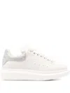 Alexander Mcqueen Oversized Sneakers With Textured Silver Heel Tab Shoes In White