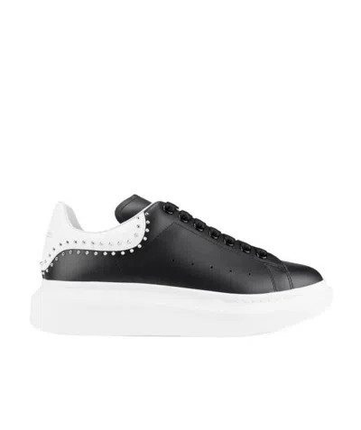 ALEXANDER MCQUEEN OVERSIZED STUDDED LOW-TOP SNEAKERS