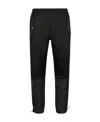 Alexander Mcqueen Panelled Tapered Track Pants In Black