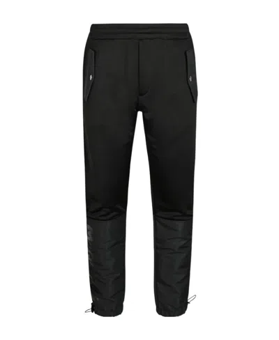 Alexander Mcqueen Panelled Tapered Track Pants In Black