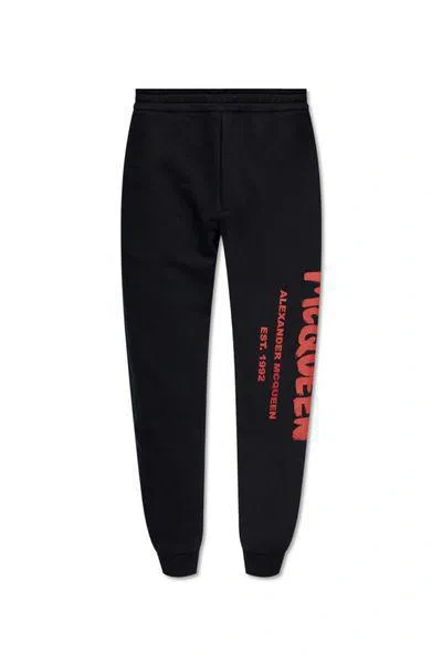 Alexander Mcqueen Mcqueen Graffiti Joggers In Black Lust Red