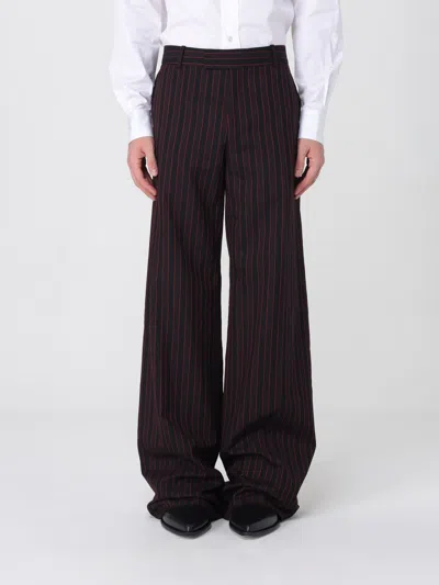 Alexander Mcqueen Pants Mcqueen Men Color Black In Brown