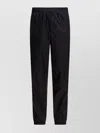 Alexander Mcqueen Patterned Trousers With Elastic Cuffs And Waistband In Black