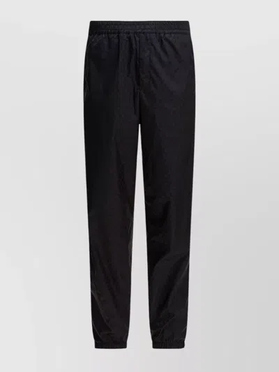 ALEXANDER MCQUEEN PATTERNED TROUSERS WITH ELASTIC CUFFS AND WAISTBAND
