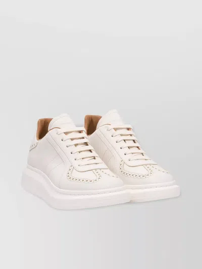 Alexander Mcqueen Perforated Round Toe Thick Sole Sneakers In White
