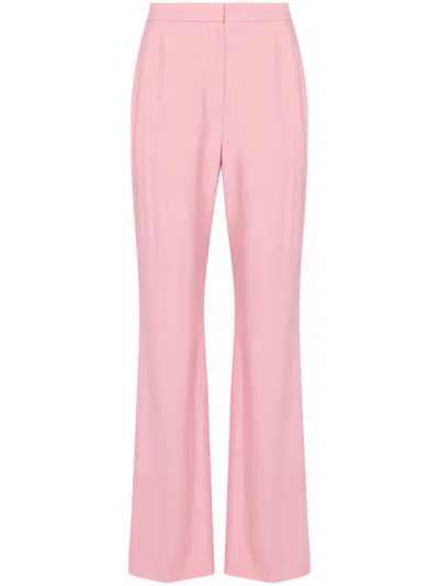 Alexander Mcqueen Pressed-crease Flared Trousers In Pink