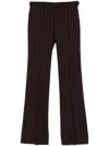 Alexander Mcqueen Pinstriped Low-sise Trousers In Black
