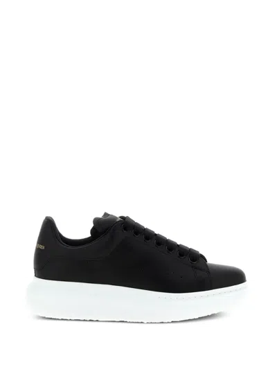 Alexander Mcqueen Black Low Top Sneakers With Logo Lettering On Tongue And Heel In Leather Woman