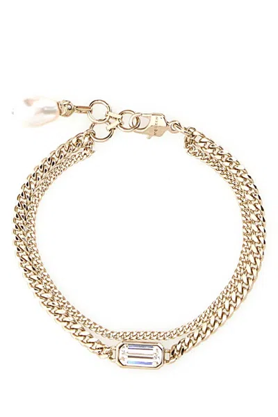 Alexander Mcqueen Platinum Metal Skull Bracelet In Gold