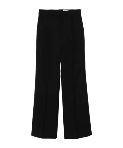 Alexander Mcqueen Pleat-detail Trousers In Black