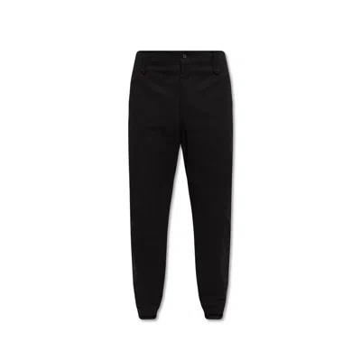 Alexander Mcqueen Pleat-front Trousers In Black