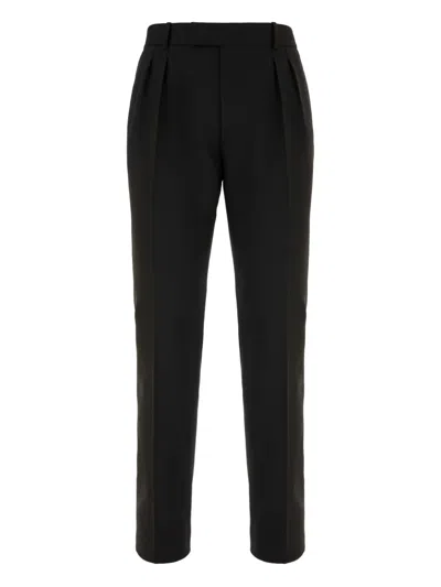 Alexander Mcqueen Pleated-front Trousers In Black