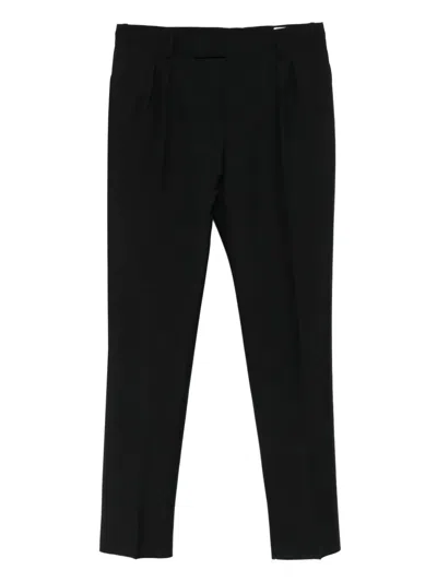 Alexander Mcqueen Pleated-front Wool Trousers In Black