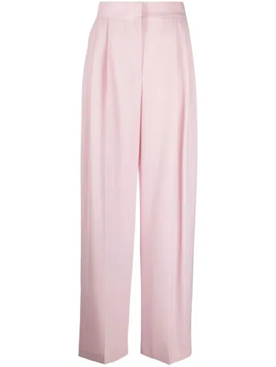 Alexander Mcqueen Wide Leg Trousers With Concealed Front Closure In Pink
