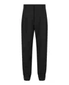 Alexander Mcqueen Pleated Wool Trousers In Black