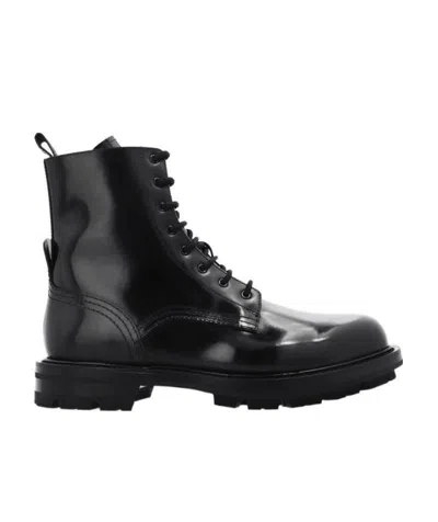 ALEXANDER MCQUEEN POLISHED LACE-UP BOOTS