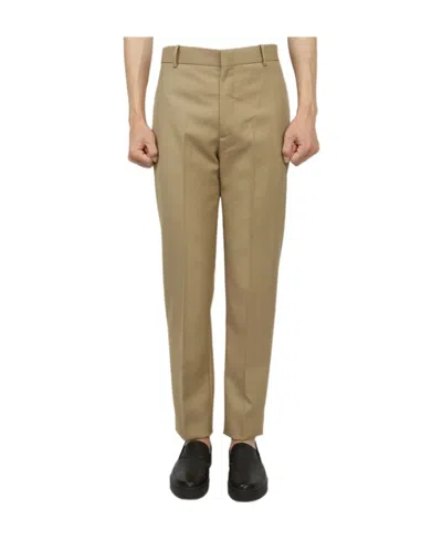 Alexander Mcqueen Pressed-crease Slim-cut Trousers In Brown