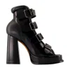 Alexander Mcqueen Caged 120 Leather Platform Sandals In Black
