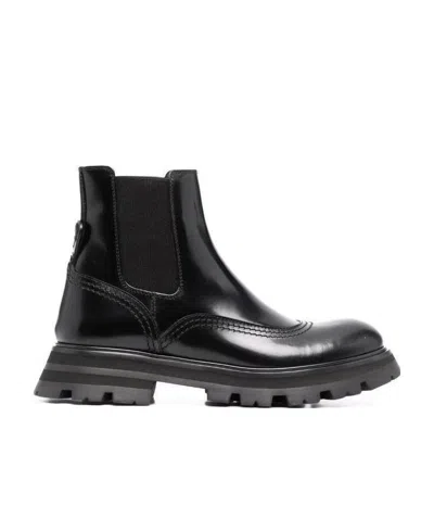 Alexander Mcqueen Ridged-sole Ankle Boots In Black