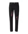 Alexander Mcqueen Ripped-detail Slim-fit Jeans In Black