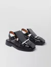 Alexander Mcqueen Round Toe Leather Sandals With Buckle Detail In Black